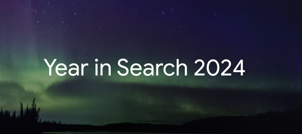 Text 'Year in Search 2024' vor einem Hintergrund mit Nordlichtern und Sternen.